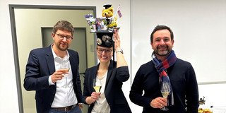 Disputation_Lisa Gussek Lisa Gussek with first examiner Prof. Dr. Manuel Wiesche (left) and second examiner Prof. Dr. Steffen Strese (right)